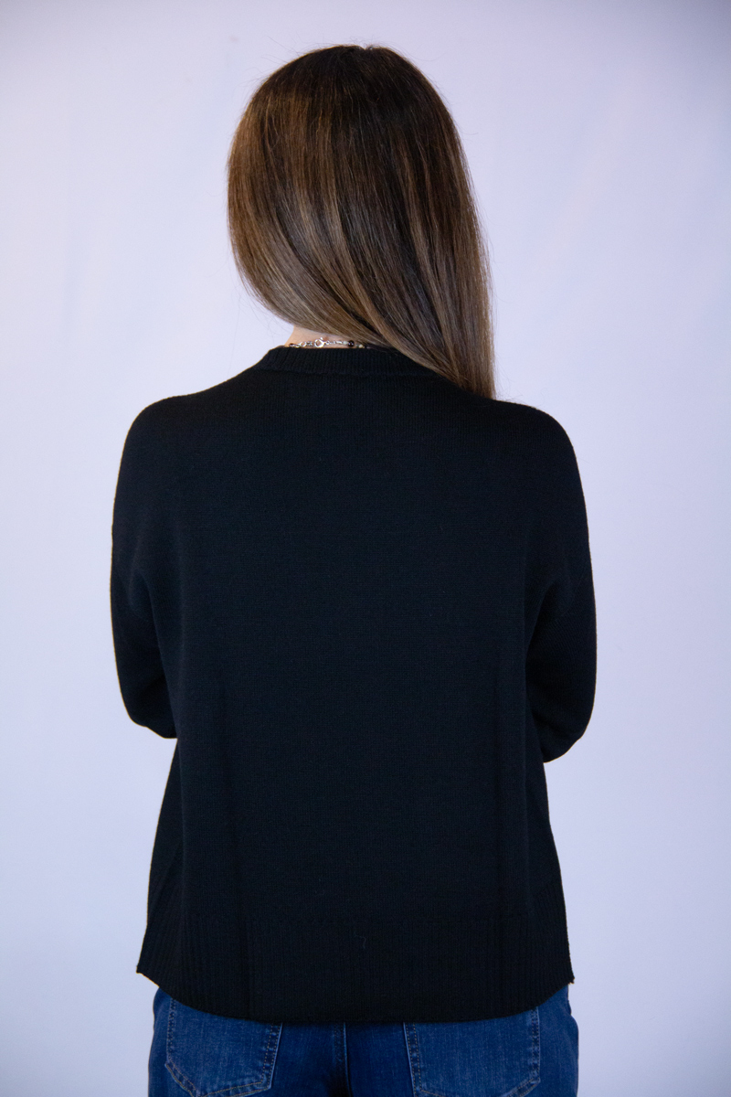 Maglia in lana merinos colore nero asimmetrica - immagine 4